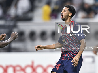 Homam El Amin of Al Duhail SC celebrates after scoring a goal during the Ooredoo Qatar Stars League 24/25 match between Al-Sadd SC and Al Du...