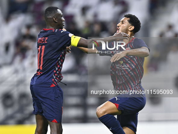 Homam El Amin of Al Duhail SC celebrates after scoring a goal during the Ooredoo Qatar Stars League 24/25 match between Al-Sadd SC and Al Du...