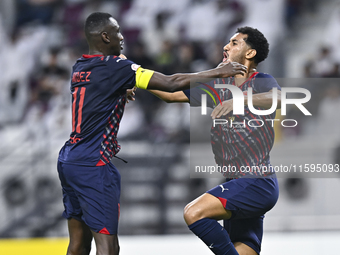 Homam El Amin of Al Duhail SC celebrates after scoring a goal during the Ooredoo Qatar Stars League 24/25 match between Al-Sadd SC and Al Du...