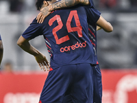 Edmilson Junior Paulo (R) of Al Duhail SC celebrates after scoring the second goal during the Ooredoo Qatar Stars League 24/25 match between...