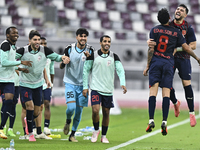 Edmilson Junior Paulo (2-R) of Al Duhail SC celebrates after scoring the second goal during the Ooredoo Qatar Stars League 24/25 match betwe...