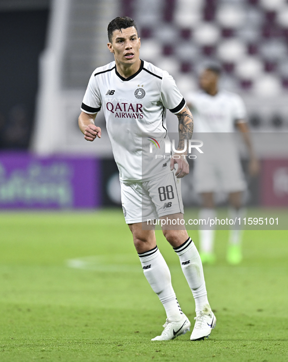 Andres Villa of Al-Sadd SC plays in the Ooredoo Qatar Stars League 24/25 match between Al-Sadd SC and Al Duhail SC at Khalifa International...