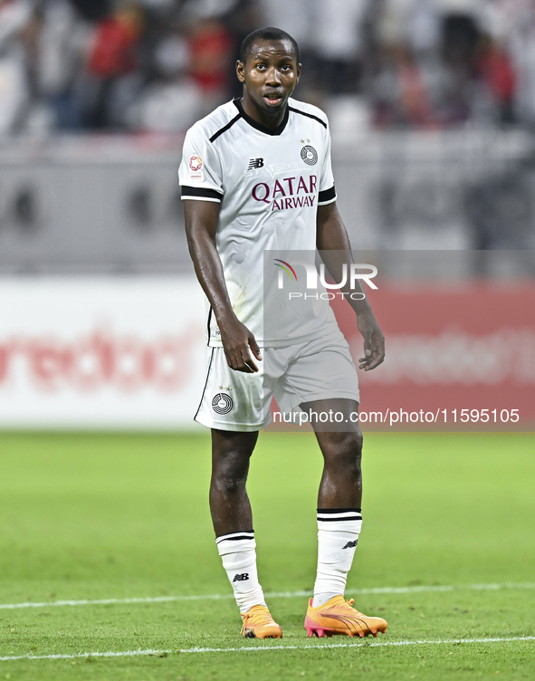 Mohamed Camara of Al-Sadd SC plays in the Ooredoo Qatar Stars League 24/25 match between Al-Sadd SC and Al Duhail SC at Khalifa Internationa...