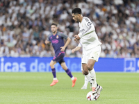 Jude Bellingham of Real Madrid is in action during the La Liga 2024/25 match between Real Madrid and Espanyol at Santiago Bernabeu Stadium i...