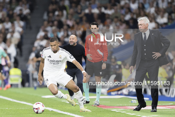 Kylian Mbappe of Real Madrid is in action during the La Liga 2024/25 match between Real Madrid and Espanyol at Santiago Bernabeu Stadium in...