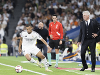 Kylian Mbappe of Real Madrid is in action during the La Liga 2024/25 match between Real Madrid and Espanyol at Santiago Bernabeu Stadium in...