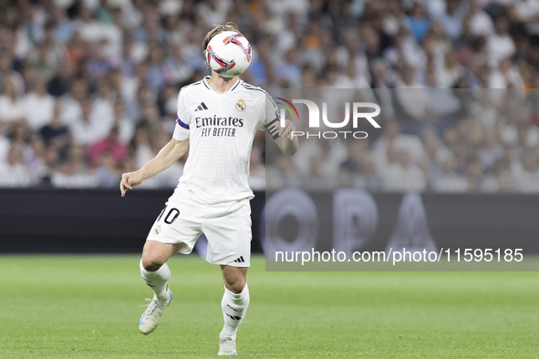 Luka Modric of Real Madrid controls the ball during the La Liga 2024/25 match between Real Madrid and Espanyol at Santiago Bernabeu Stadium...