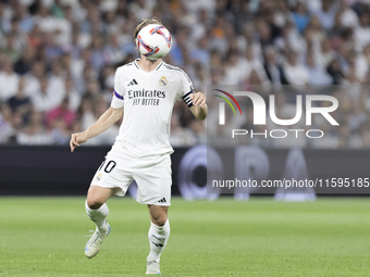 Luka Modric of Real Madrid controls the ball during the La Liga 2024/25 match between Real Madrid and Espanyol at Santiago Bernabeu Stadium...