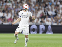 Luka Modric of Real Madrid controls the ball during the La Liga 2024/25 match between Real Madrid and Espanyol at Santiago Bernabeu Stadium...