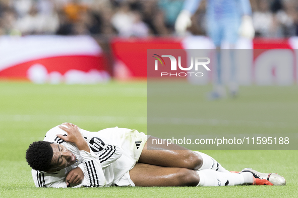 Jude Bellingham of Real Madrid is injured during the La Liga 2024/25 match between Real Madrid and Espanyol at Santiago Bernabeu Stadium in...