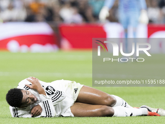 Jude Bellingham of Real Madrid is injured during the La Liga 2024/25 match between Real Madrid and Espanyol at Santiago Bernabeu Stadium in...