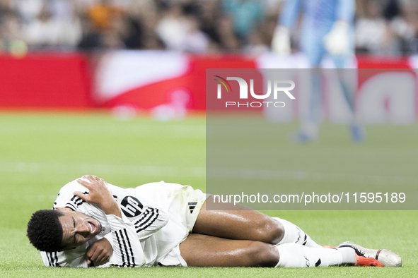 Jude Bellingham of Real Madrid is injured during the La Liga 2024/25 match between Real Madrid and Espanyol at Santiago Bernabeu Stadium in...