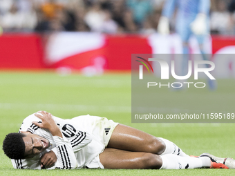 Jude Bellingham of Real Madrid is injured during the La Liga 2024/25 match between Real Madrid and Espanyol at Santiago Bernabeu Stadium in...