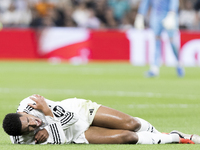 Jude Bellingham of Real Madrid is injured during the La Liga 2024/25 match between Real Madrid and Espanyol at Santiago Bernabeu Stadium in...