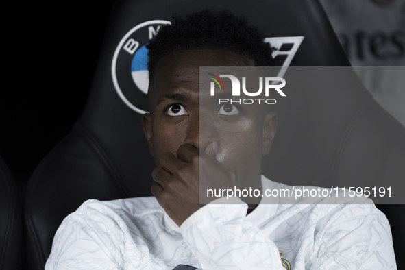 Vinicius Jr of Real Madrid sits on the bench during the La Liga 2024/25 match between Real Madrid and Espanyol at Santiago Bernabeu Stadium...