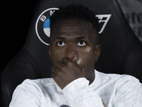 Vinicius Jr of Real Madrid sits on the bench during the La Liga 2024/25 match between Real Madrid and Espanyol at Santiago Bernabeu Stadium...