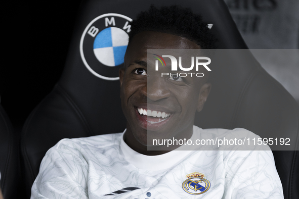 Vinicius Jr of Real Madrid sits on the bench during the La Liga 2024/25 match between Real Madrid and Espanyol at Santiago Bernabeu Stadium...