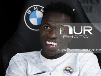 Vinicius Jr of Real Madrid sits on the bench during the La Liga 2024/25 match between Real Madrid and Espanyol at Santiago Bernabeu Stadium...