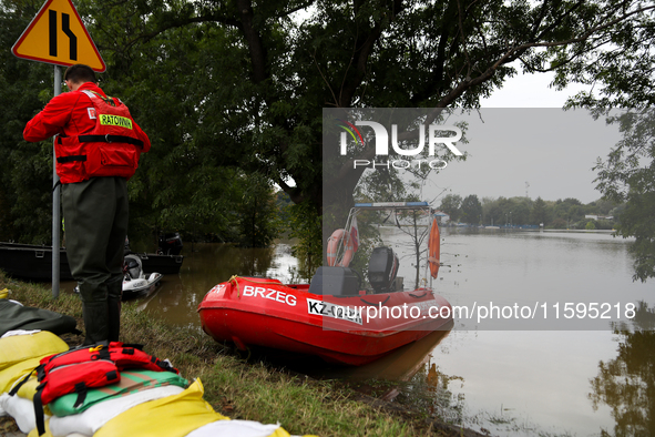 A rescuer with a motorboat in flooded areas of the city during flooding and the Odra River flooding in Brzeg, Poland, on September 19, 2023....