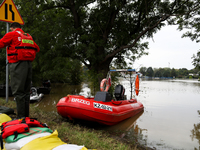 A rescuer with a motorboat in flooded areas of the city during flooding and the Odra River flooding in Brzeg, Poland, on September 19, 2023....