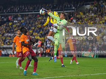 Youssef En-Nesyri of Fenerbahce and Fernando Muslera of Galatasaray battle for the ball during the Turkey Süper Ligue Round 5 between Fenerb...