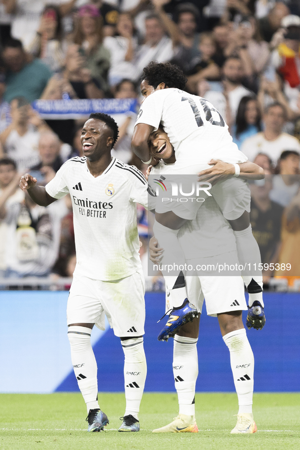 Kylian Mbappe of Real Madrid, Vinicius Jr. of Real Madrid, and Endrick of Real Madrid celebrate a goal during the La Liga 2024/25 match betw...