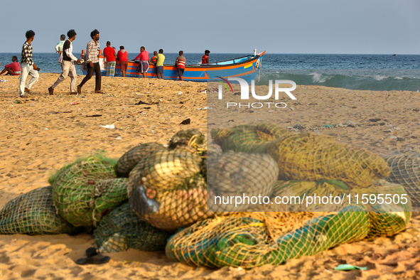 Fishing nets by the ocean along Paruthiyoor Beach in Paruthiyoor, Kerala, India, on April 15, 2024. 