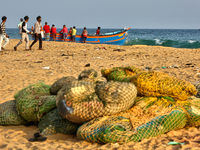 Fishing nets by the ocean along Paruthiyoor Beach in Paruthiyoor, Kerala, India, on April 15, 2024. (