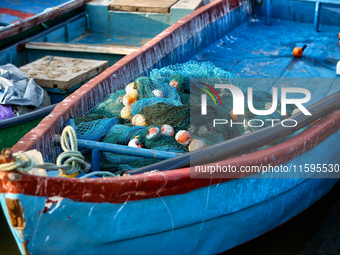 Fishing boats are in the ocean along Paruthiyoor Beach in Paruthiyoor, Kerala, India, on April 15, 2024. (