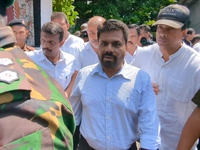 Sri Lanka's presidential candidate of National People's Power (NPP), Anura Kumara Dissanayake, leaves after casting his vote at a polling ce...