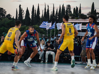 The flags of Greece and the Olympic Games are displayed during the match between Maccabi Playtika Tel Aviv and Anadolu Efes for the Pavlos G...