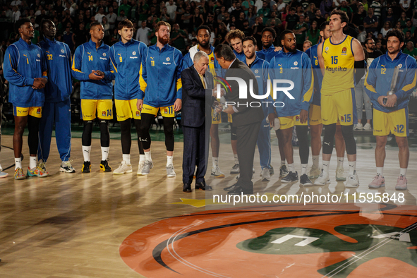 Maccabi Tel Aviv president Mr. Shimon Mizrahi receives the commemorative award for his team's participation in the Pavlos Giannakopoulos fri...