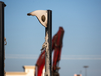 The remnants of a melted rock climbing wall in a playground are visible following a liquefied gas pipeline explosion in a residential area o...