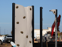 A rock climbing wall in a playground warps from the intense heat of a liquefied gas pipeline explosion in a residential area of La Porte nea...