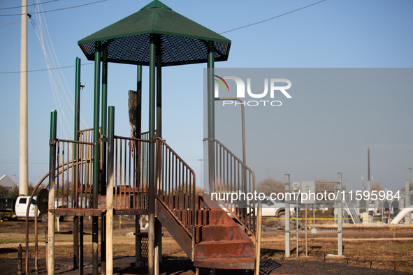 A playground is charred and melted following a liquefied gas pipeline explosion in a residential area of La Porte near Houston, Texas, on Se...