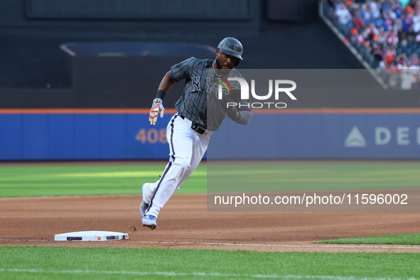 New York Mets' Starling Marte #6 scores during the seventh inning of the baseball game against the Philadelphia Phillies at Citi Field in Co...