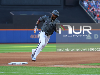 New York Mets' Starling Marte #6 scores during the seventh inning of the baseball game against the Philadelphia Phillies at Citi Field in Co...