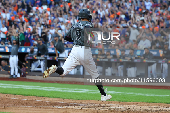 Brandon Nimmo #9 of the New York Mets scores during the seventh inning of the baseball game against the Philadelphia Phillies at Citi Field...