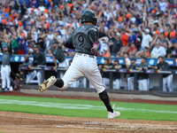 Brandon Nimmo #9 of the New York Mets scores during the seventh inning of the baseball game against the Philadelphia Phillies at Citi Field...