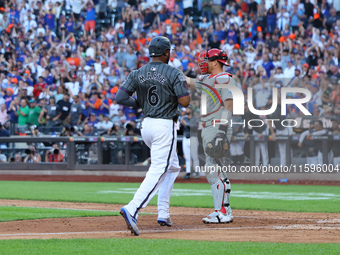 New York Mets' Starling Marte #6 scores during the seventh inning of the baseball game against the Philadelphia Phillies at Citi Field in Co...