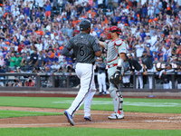 New York Mets' Starling Marte #6 scores during the seventh inning of the baseball game against the Philadelphia Phillies at Citi Field in Co...