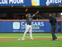 Francisco Alvarez #4 of the New York Mets celebrates after driving in two runs with a double during the seventh inning of the baseball game...