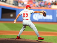 Philadelphia Phillies starting pitcher Ranger Suarez #55 throws during the third inning of a baseball game against the New York Mets at Citi...