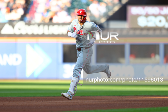 Philadelphia Phillies' Nick Castellanos #8 rounds the bases after homering during the fifth inning of a baseball game against the New York M...