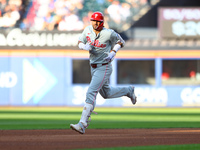 Philadelphia Phillies' Nick Castellanos #8 rounds the bases after homering during the fifth inning of a baseball game against the New York M...