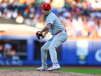 Philadelphia Phillies relief pitcher Orion Kerkering #50 throws during the seventh inning of a baseball game against the New York Mets at Ci...