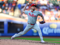 Philadelphia Phillies relief pitcher Orion Kerkering #50 throws during the seventh inning of a baseball game against the New York Mets at Ci...