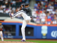 New York Mets relief pitcher Edwin Diaz #39 throws during the eighth inning of the baseball game against the Philadelphia Phillies at Citi F...