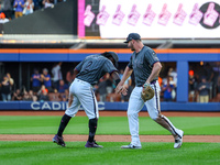 The New York Mets celebrate their 6-2 win in the baseball game against the Philadelphia Phillies at Citi Field in Corona, N.Y., on September...