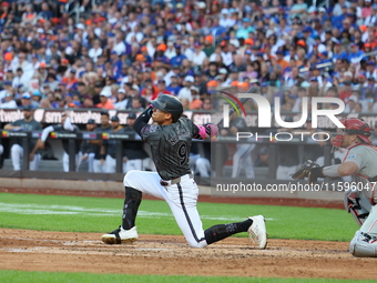 Brandon Nimmo #9 of the New York Mets singles during the seventh inning of the baseball game against the Philadelphia Phillies at Citi Field...